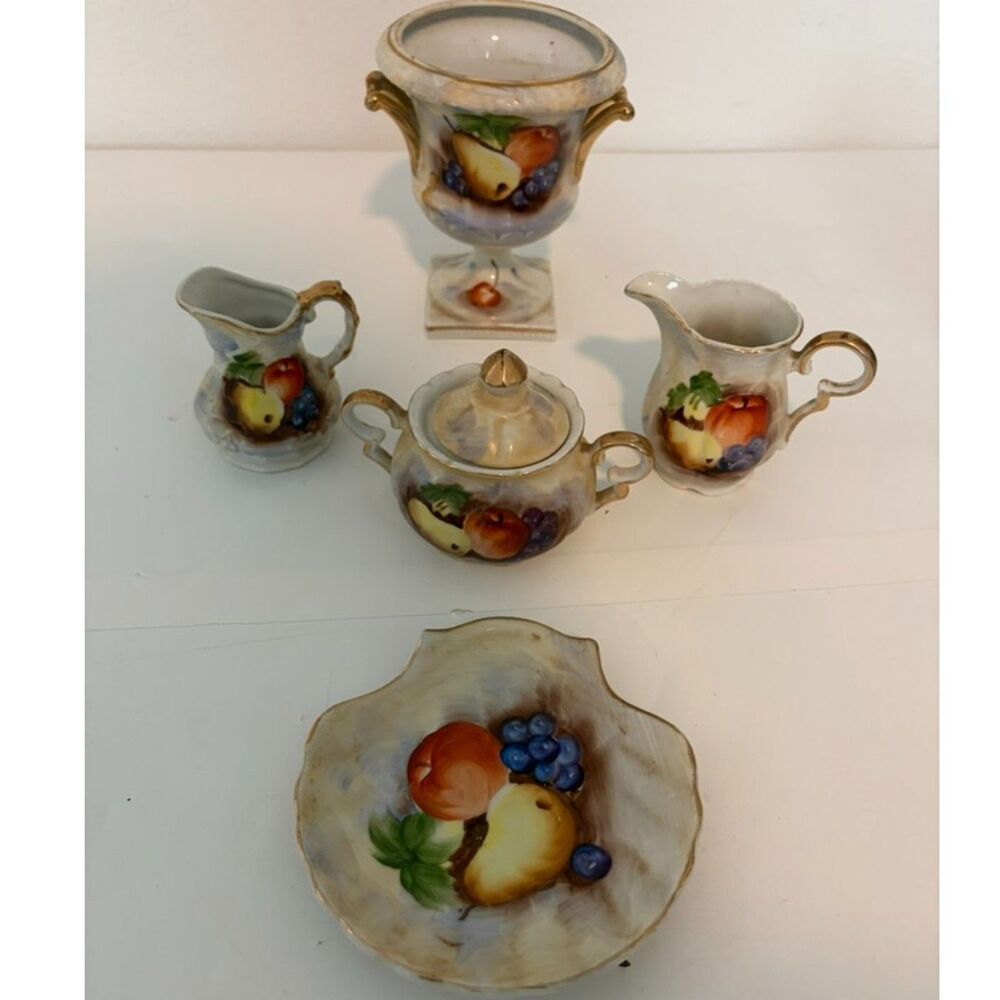 vtg Porcelain tea set with hand painted fruit motifs and gold trim